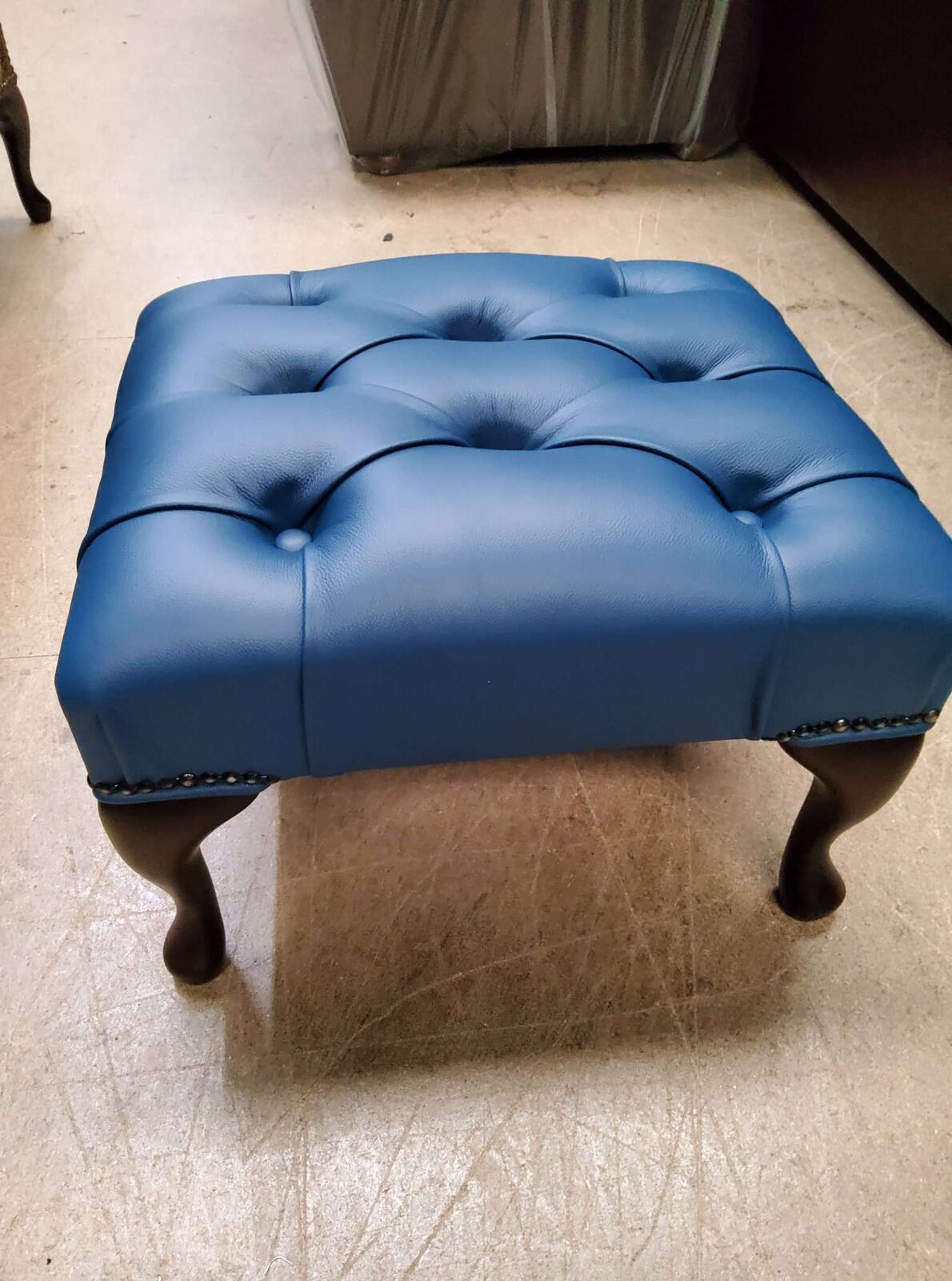 Product photograph of Chesterfield Queen Anne Footstool Shelly Blue Leather Special Offer from Designer Sofas 4U