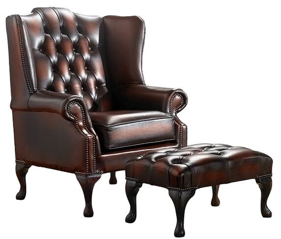 Rub off Antique Rust Leather Chesterfield Handmade Mallory Flat Wing Back Armchair + Footstool | DesignerSofas4U