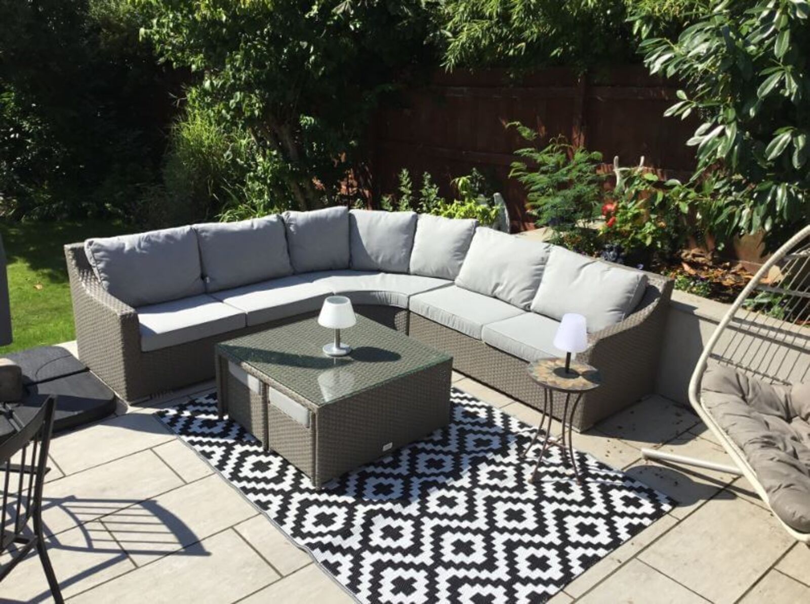 Product photograph of Elena Large Corner Grey Rattan Garden Sofa Set With Square Coffee Table 4 Stools In Grey from Designer Sofas 4U