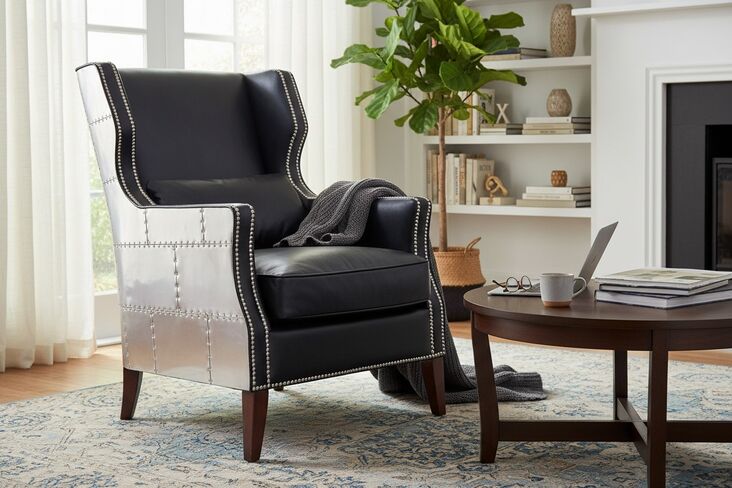 Aviator Black Leather Accent Chair – Industrial Luxury Armchair with Aluminum Panels