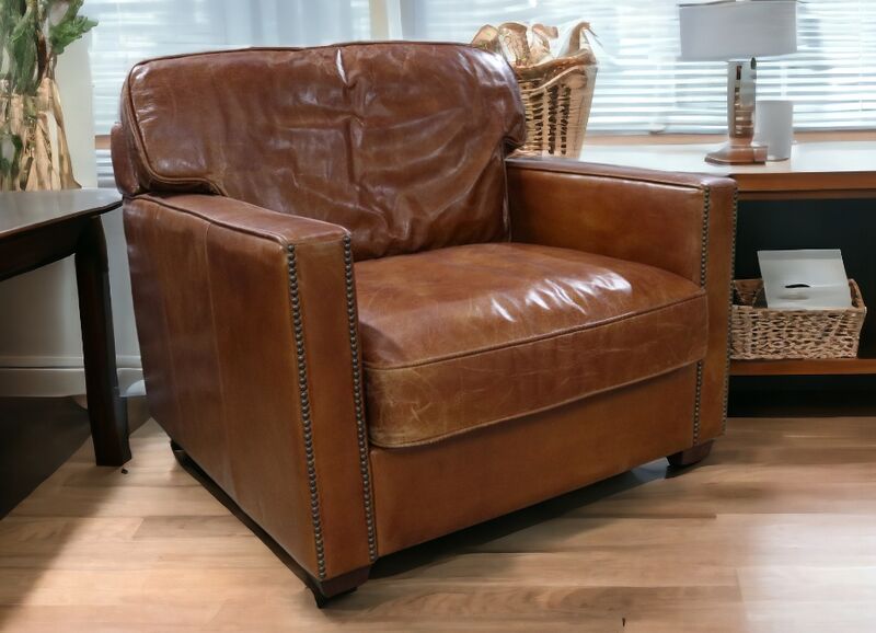 Product photograph of Battersea Vintage Tan Distressed Real Leather Armchair from Designer Sofas 4U