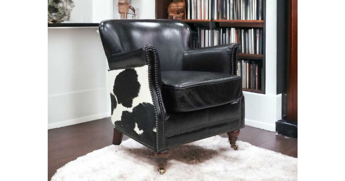 Rustic Luxury: Vintage Distressed Leather Armchair in Black Cow Finish