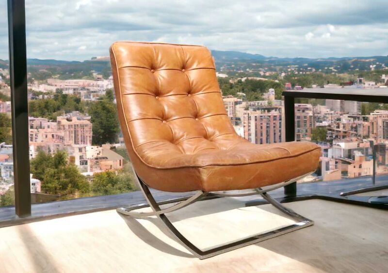 Product photograph of Chesterfield Buttoned Vintage Tan Leather Lounge Chair from Designer Sofas 4U