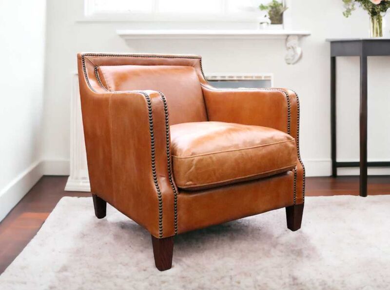 Product photograph of Chichester Vintage Tan Distressed Leather Stud Armchair from Designer Sofas 4U