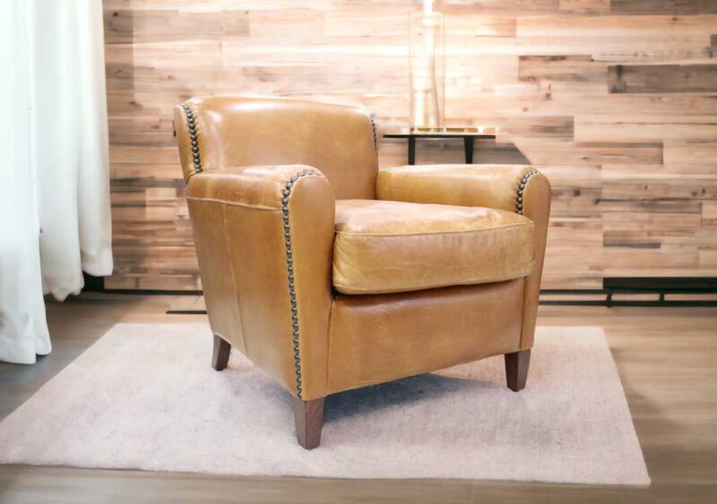 Product photograph of Eccentric Vintage Tan Distressed Leather Club Chair from Designer Sofas 4U