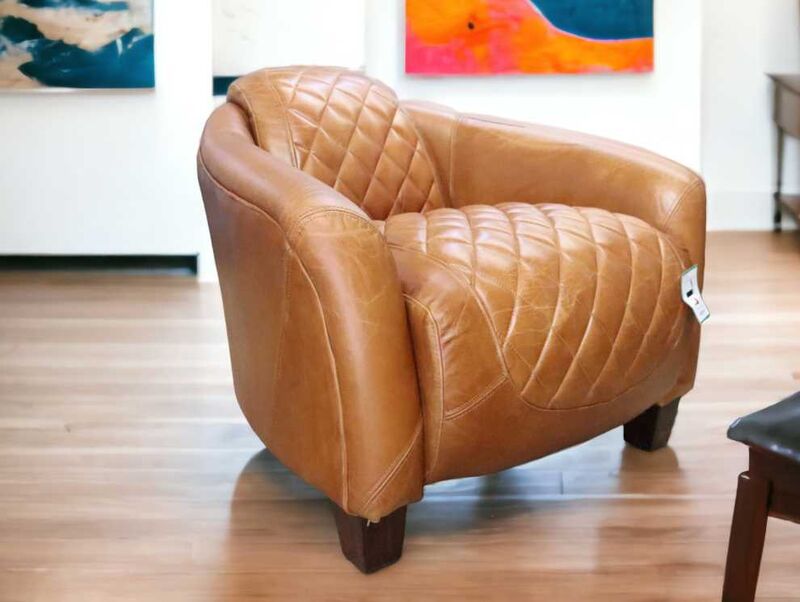 Product photograph of Quilted Vintage Tan Distressed Leather Tub Chair from Designer Sofas 4U