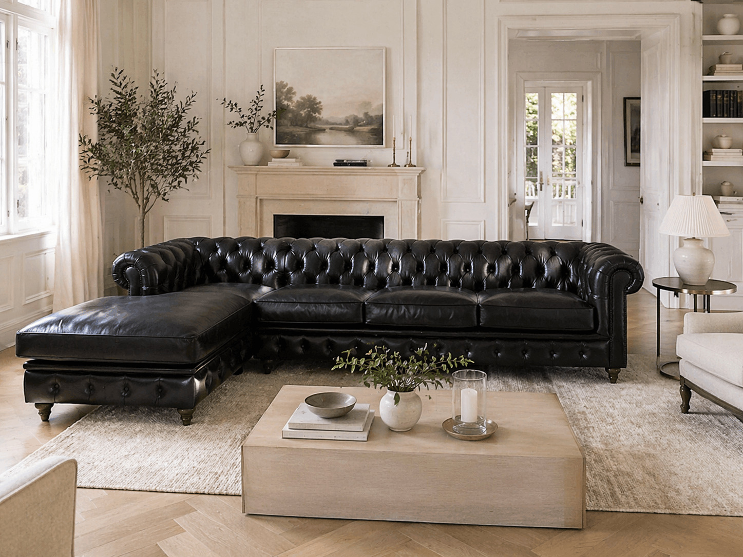 Black corner sofa in a bright neutral living room with elegant classic interior
