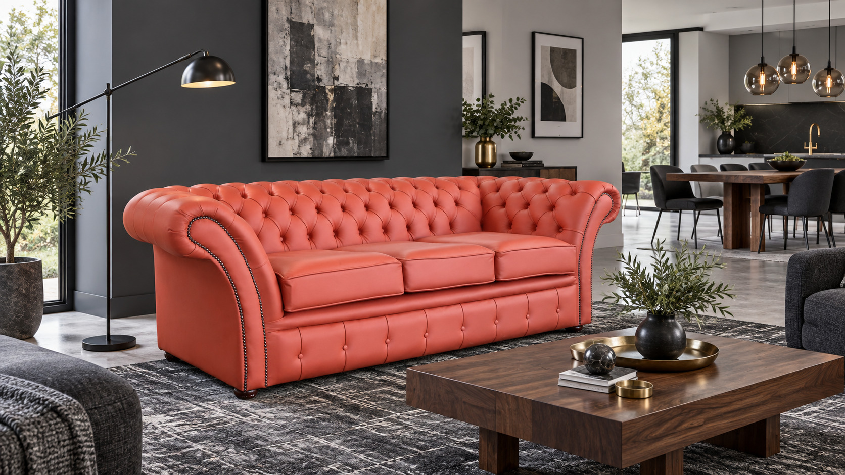 Orange Chesterfield sofa in a charcoal grey and black interior