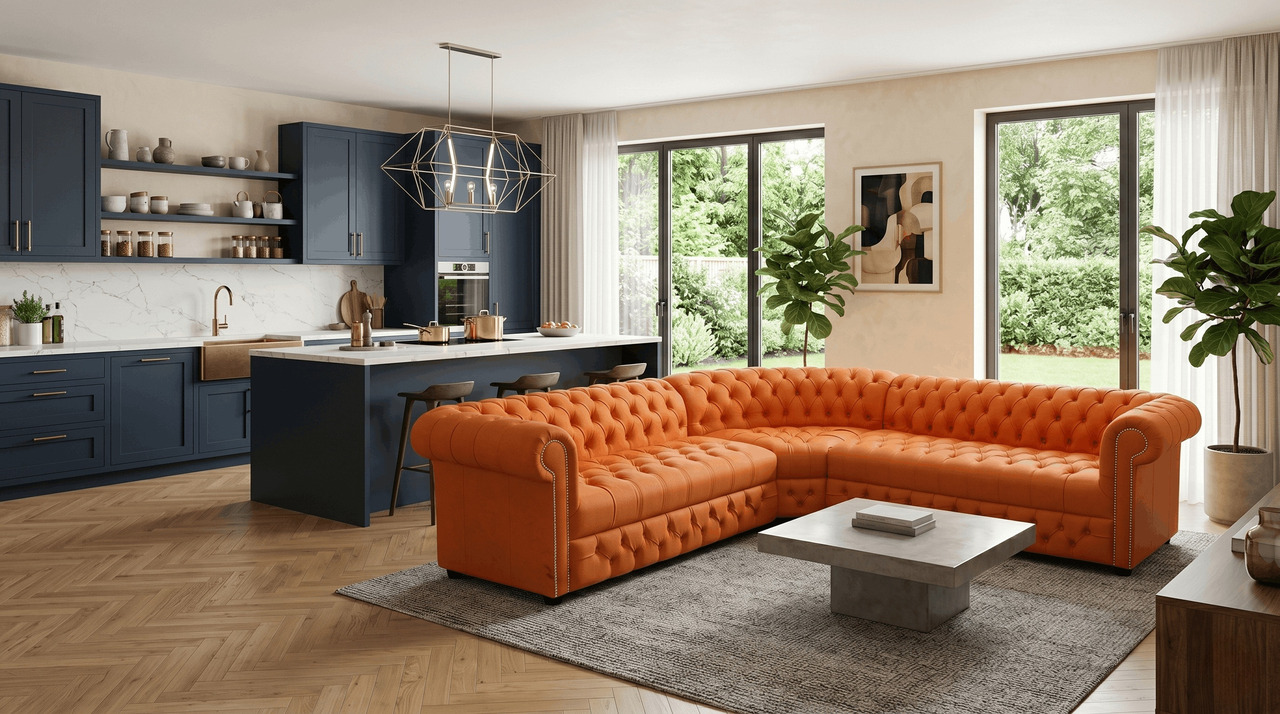 Orange Chesterfield sofa in an open-plan kitchen