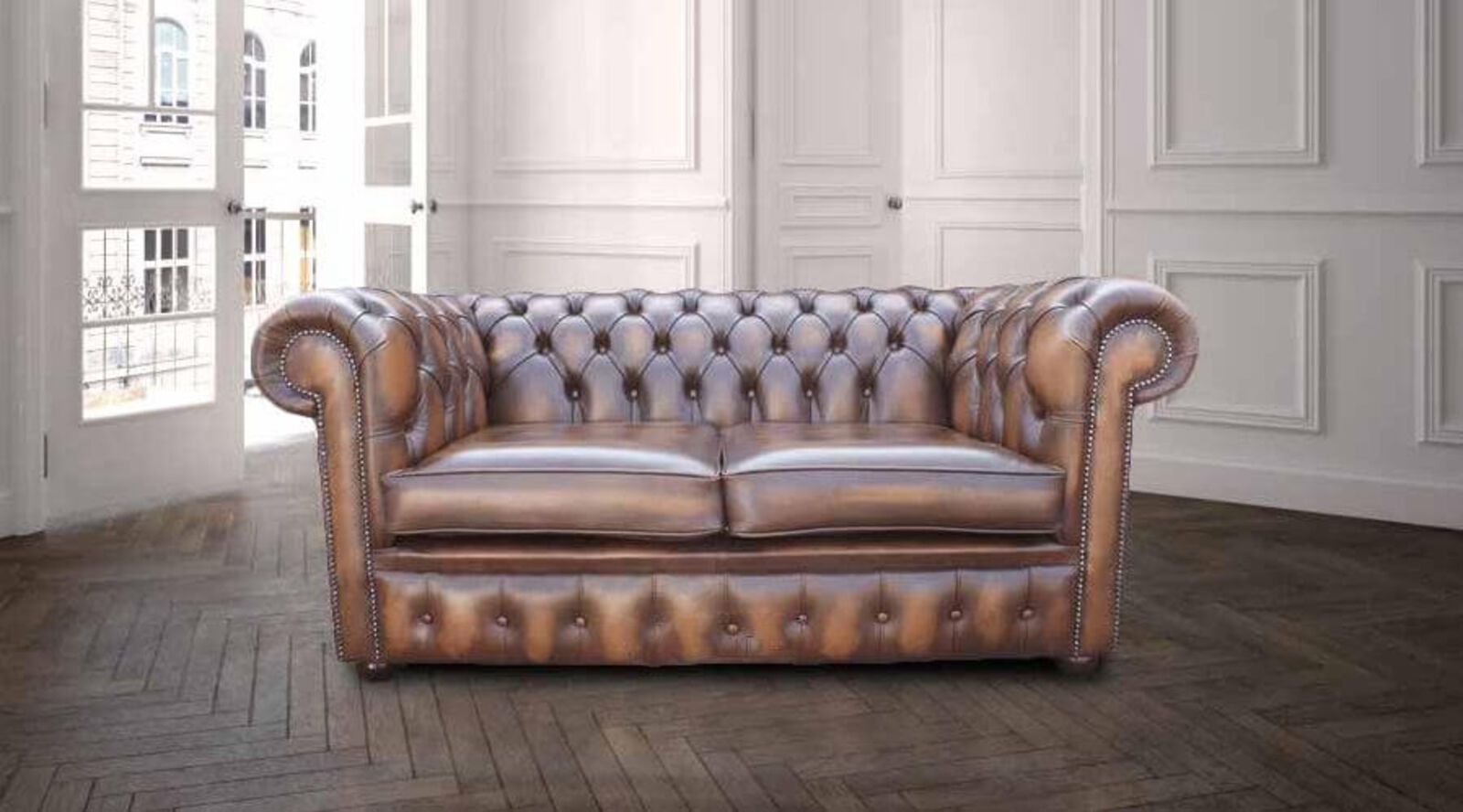 Product photograph of Chesterfield Handmade 2 Seater Antique Tan Real Leather Sofa from Designer Sofas 4U