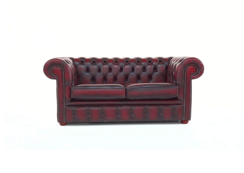 Product photograph of Chesterfield 2 Seater Sofa Antique Oxblood Red Real Leather from Designer Sofas 4U