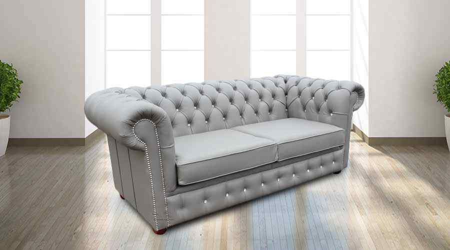 Grey leather Chesterfield sofa bed with crystal buttons