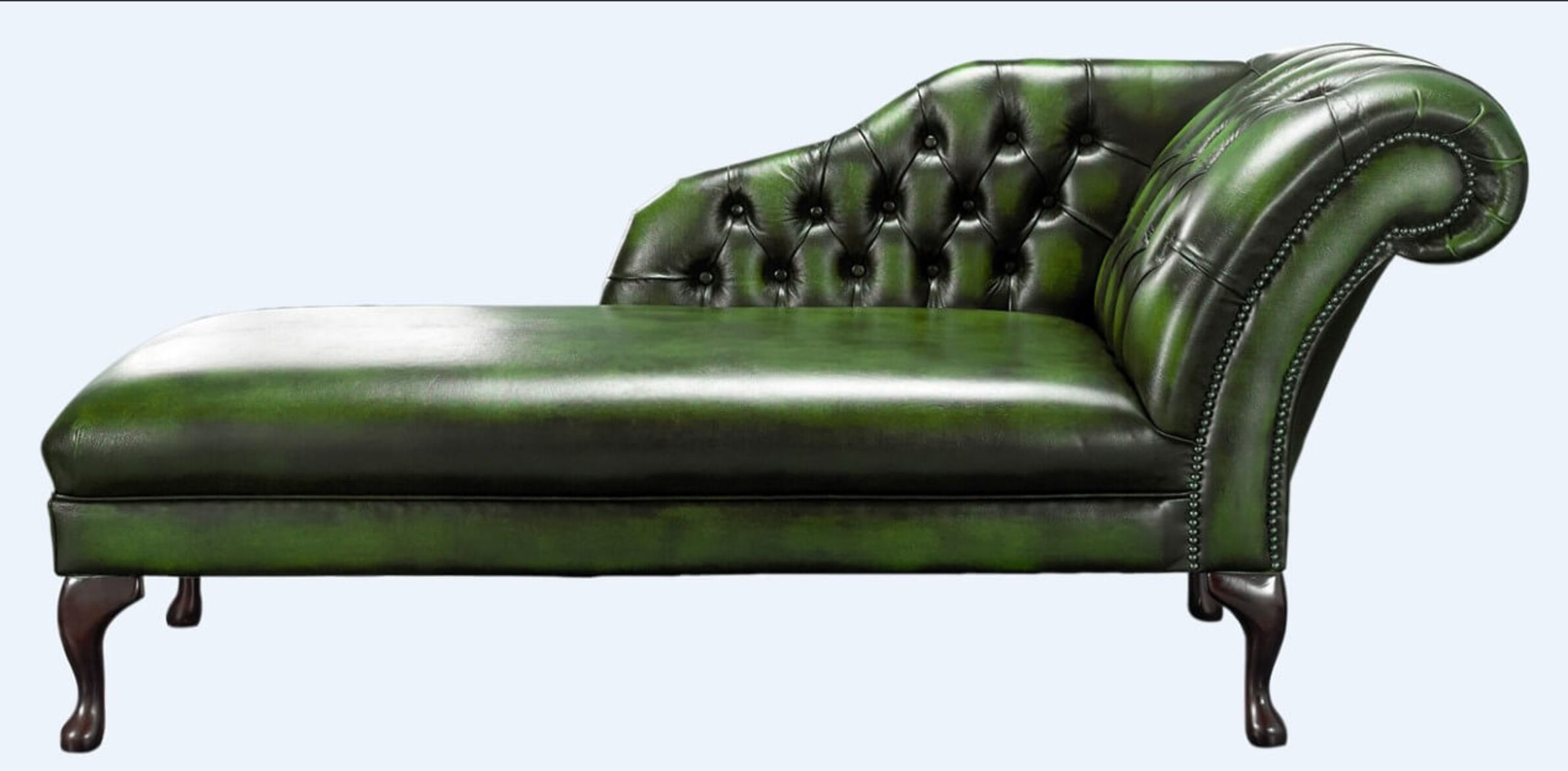 green chaise and brown leather sofa