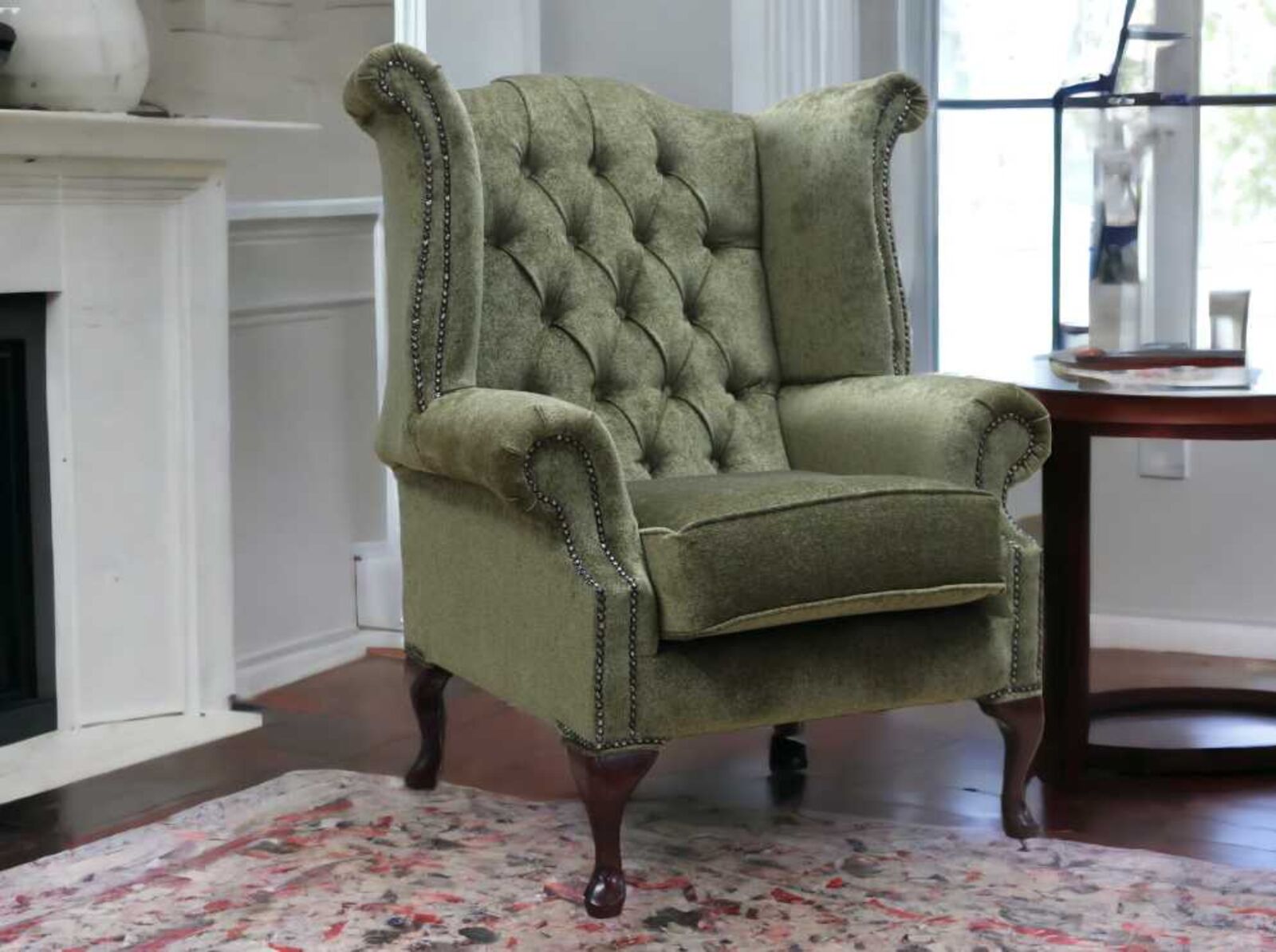 Product photograph of Chesterfield Fabric Queen Anne High Back Wing Chair Velluto Moss Green from Designer Sofas 4U