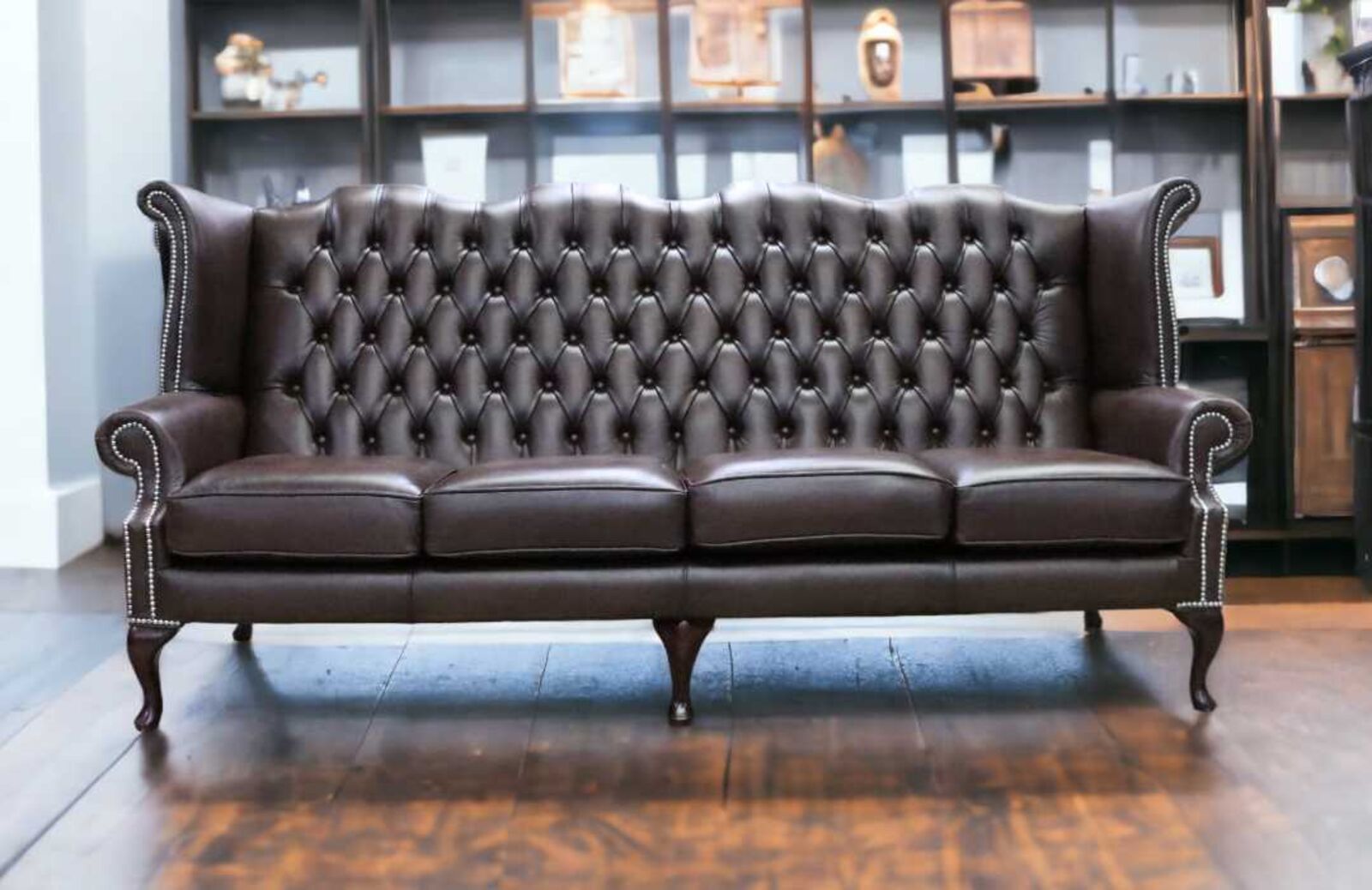 Product photograph of Chesterfield 4 Seater Queen Anne High Back Wing Sofa Antique Brown Leather from Designer Sofas 4U