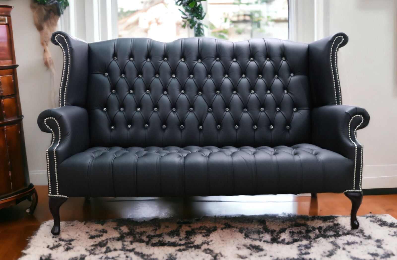 Product photograph of Chesterfield Crystal Diamante 3 Seater Queen Anne Buttoned Seat High Back Wing Sofa Black Leather Designersofas4u from Designer Sofas 4U