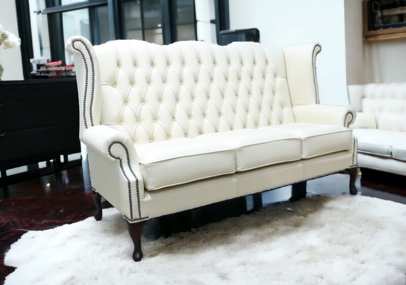 Product photograph of Chesterfield 3 Seater Queen Anne High Back Wing Sofa Cream Leather from Designer Sofas 4U
