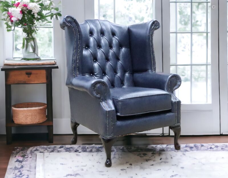 Product photograph of Chesterfield Queen Anne High Back Wing Chair Old English Ocean Blue from Designer Sofas 4U