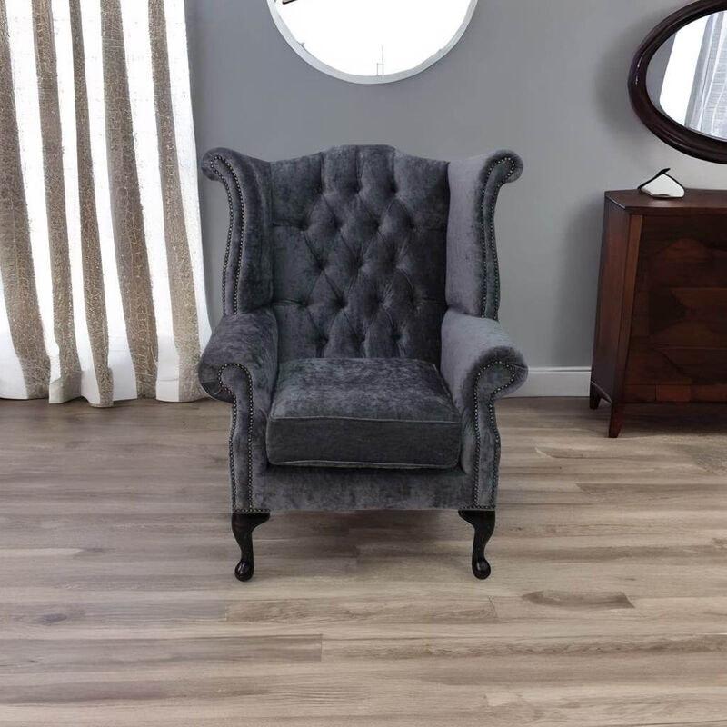 Product photograph of Chesterfield Queen Anne High Back Wing Chair Pastiche Steel Velvet from Designer Sofas 4U
