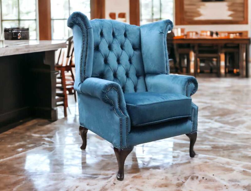 Product photograph of Chesterfield Velvet Queen Anne Wing Chair Peacock Blue Velvet from Designer Sofas 4U