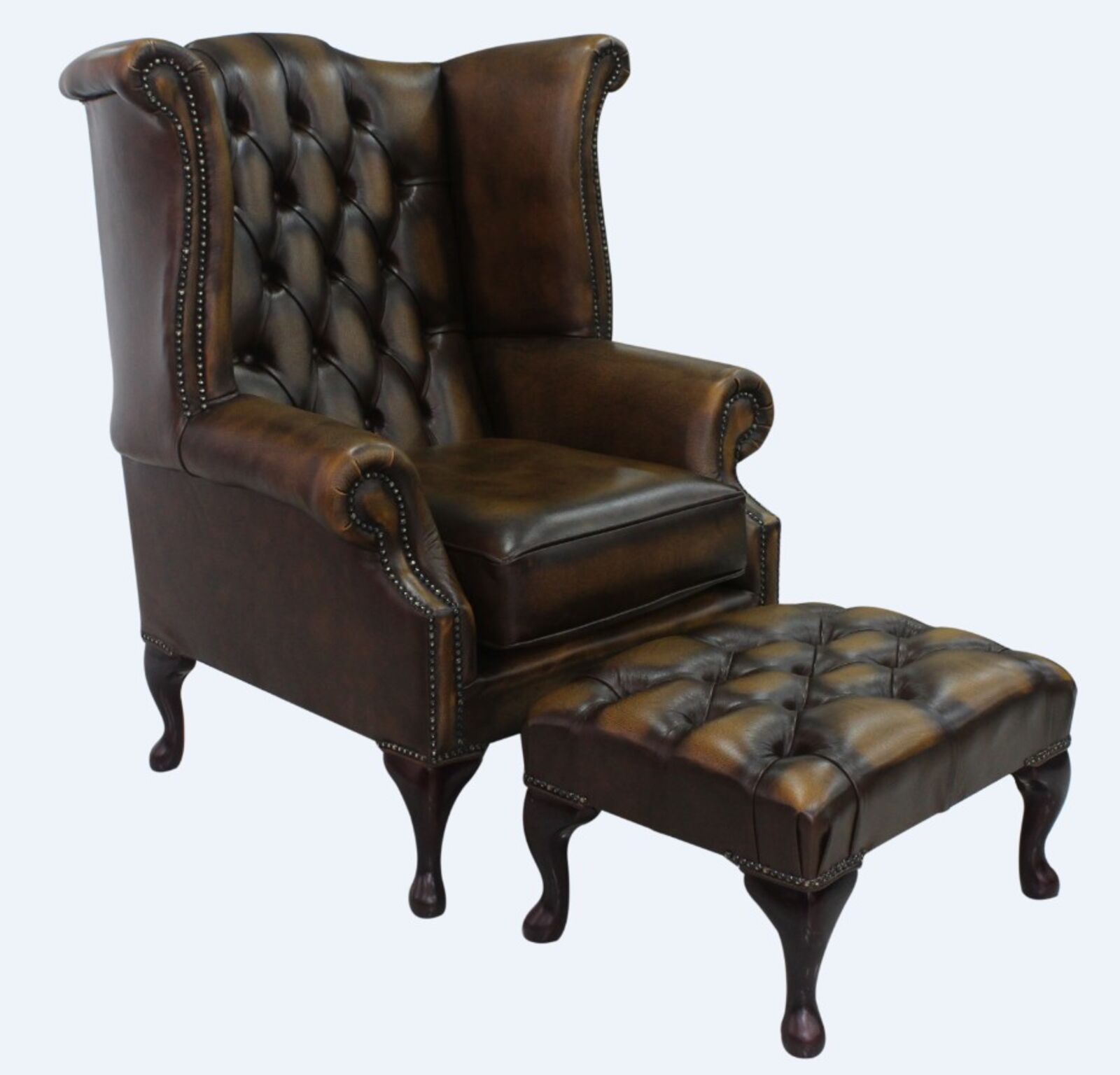 Product photograph of Chesterfield Offer Queen Anne High Back Wing Chair Antique Gold Leather Footstool from Designer Sofas 4U
