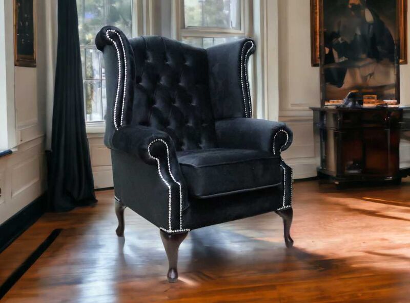 Product photograph of Chesterfield Queen Anne High Back Wing Chair Monaco Black Velvet from Designer Sofas 4U