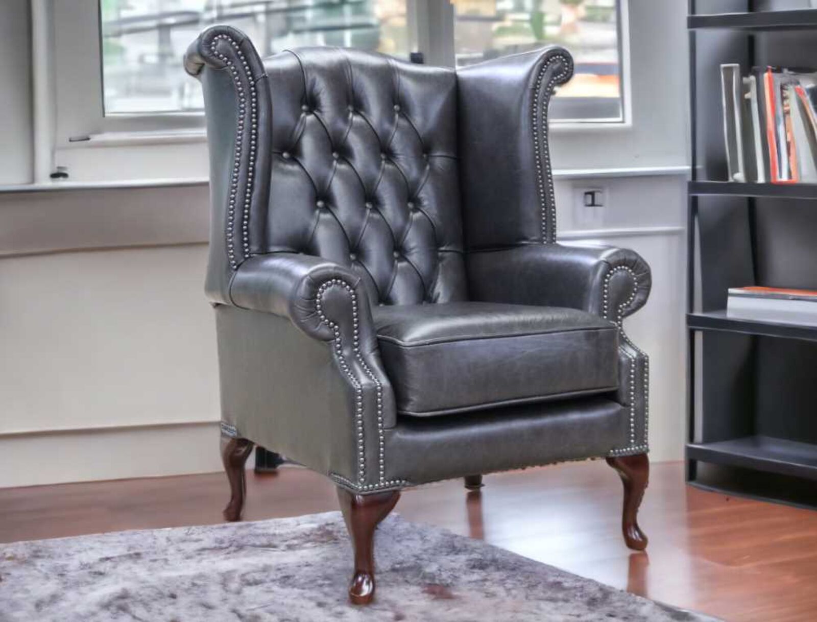Product photograph of Chesterfield Queen Anne High Back Wing Chair Old English Storm from Designer Sofas 4U