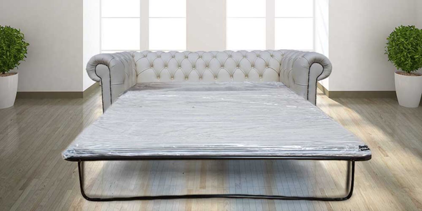 Product photograph of Pull Out Sofa Bed In Chesterfield 3 Seater Holyrood Shelly White Leather from Designer Sofas 4U