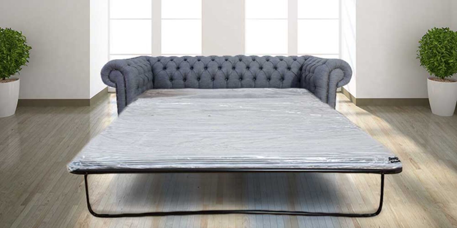 Product photograph of Best Pull Out Sofa Bed In Zoe Granite Grey Fabric Chesterfield 3 Seater from Designer Sofas 4U