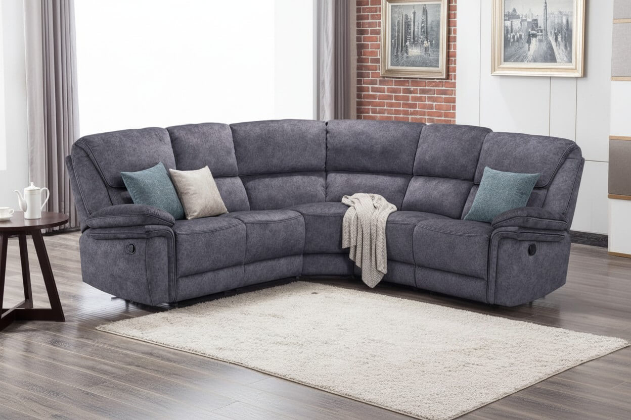 Charcoal grey fabric reclining corner sofa with teal cushions
